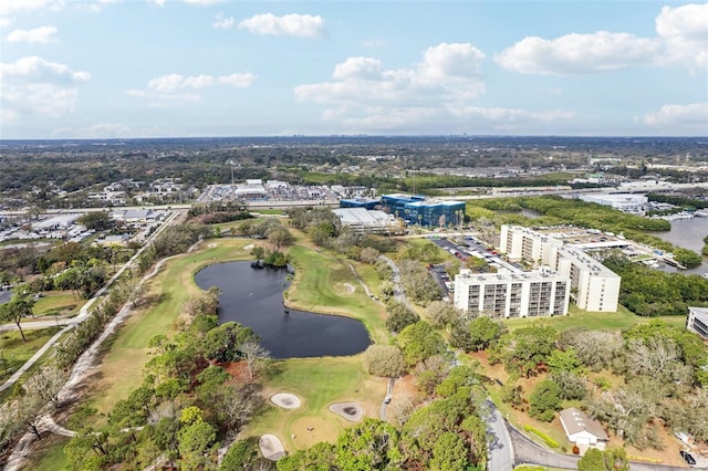 birds eye view of property featuring a water view, a city view, and golf course view