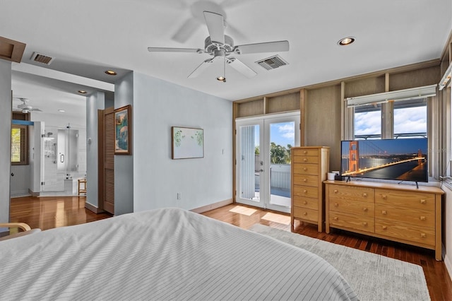 bedroom featuring access to exterior, visible vents, wood finished floors, and french doors