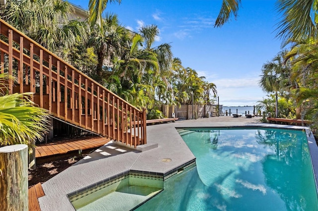 view of pool with a fenced in pool