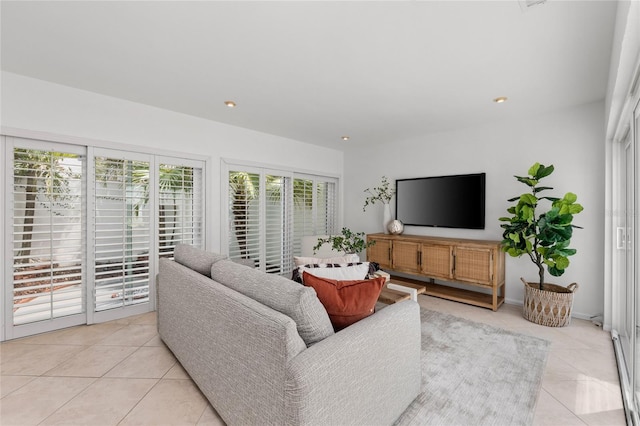 3101 W El Prado Blvd Unit B, Tampa, FL 33629 - living room featuring light tile patterned flooring and recessed lighting