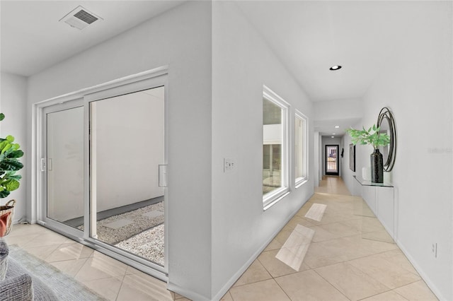 3101 W El Prado Blvd Unit B, Tampa, FL 33629 - hall with light tile patterned flooring, recessed lighting, and baseboards