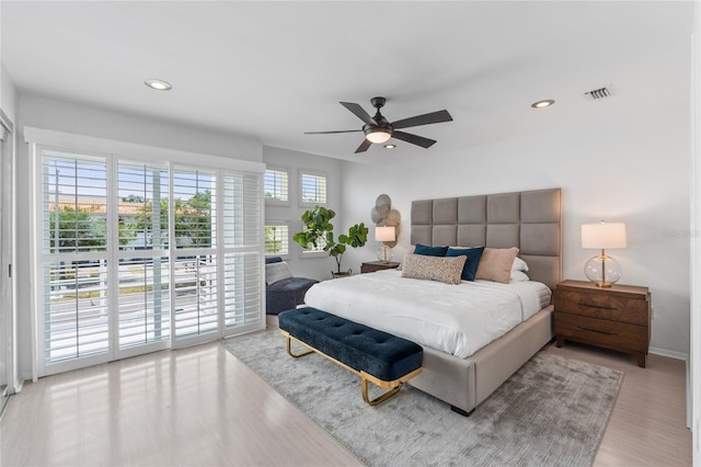 3101 W El Prado Blvd Unit B, Tampa, FL 33629 - bedroom with access to exterior, recessed lighting, light wood-style flooring, a ceiling fan, and baseboards