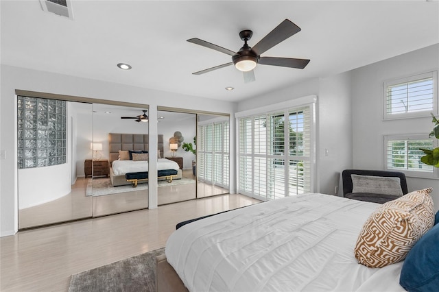 3101 W El Prado Blvd Unit B, Tampa, FL 33629 - bedroom with two closets, wood finished floors, recessed lighting, and ceiling fan