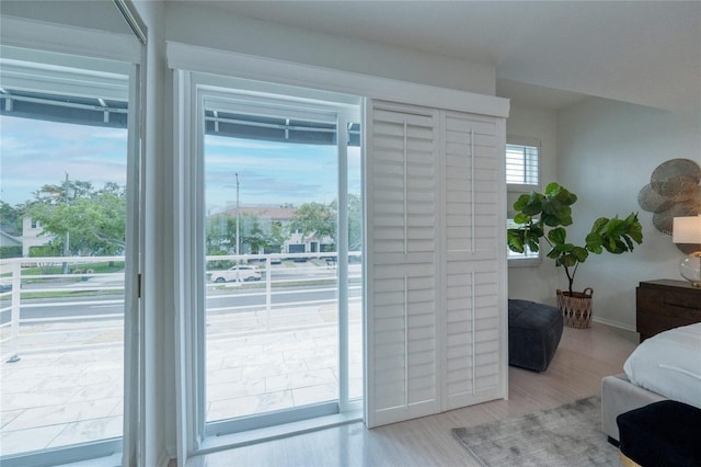 3101 W El Prado Blvd Unit B, Tampa, FL 33629 - bedroom with wood finished floors and access to exterior
