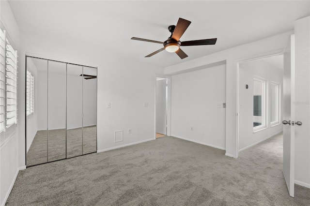 3101 W El Prado Blvd Unit B, Tampa, FL 33629 - unfurnished bedroom with carpet flooring, baseboards, and ceiling fan