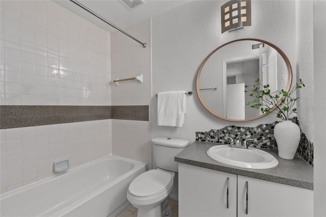 3101 W El Prado Blvd Unit B, Tampa, FL 33629 - full bath featuring vanity, a textured wall, tub / shower combination, and toilet
