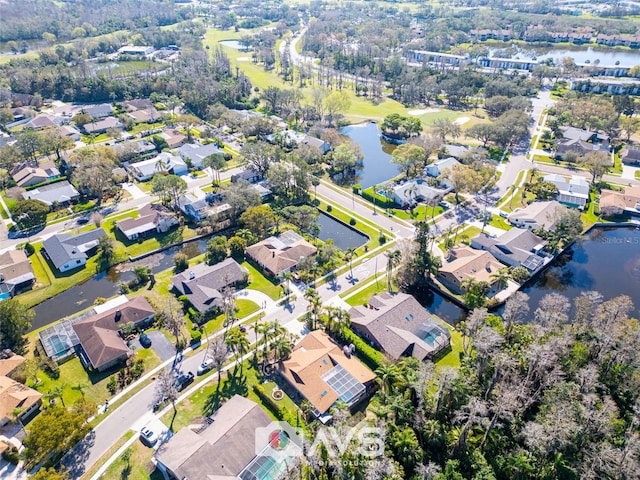 aerial view featuring a water view and a residential view