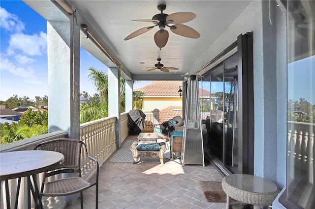 view of patio / terrace with a ceiling fan