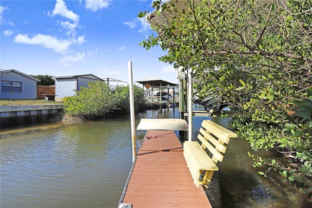 dock area featuring a water view