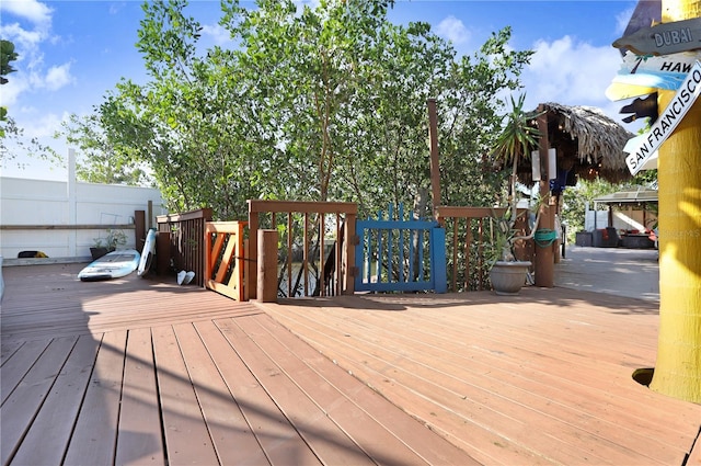 wooden deck featuring fence