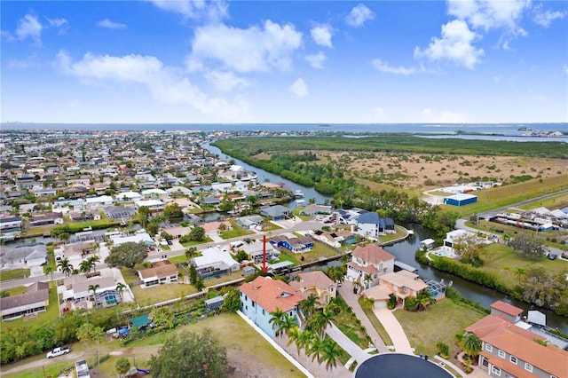 aerial view featuring a water view and a residential view