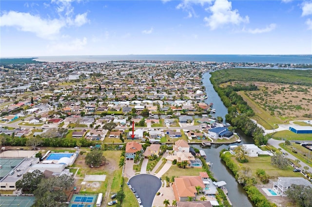 bird's eye view with a water view and a residential view