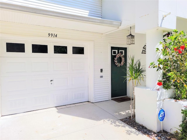 entrance to property with a garage