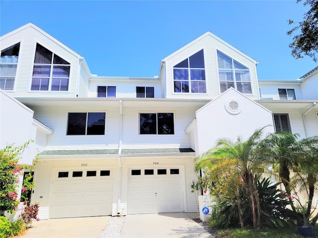 view of front of house with a garage and driveway