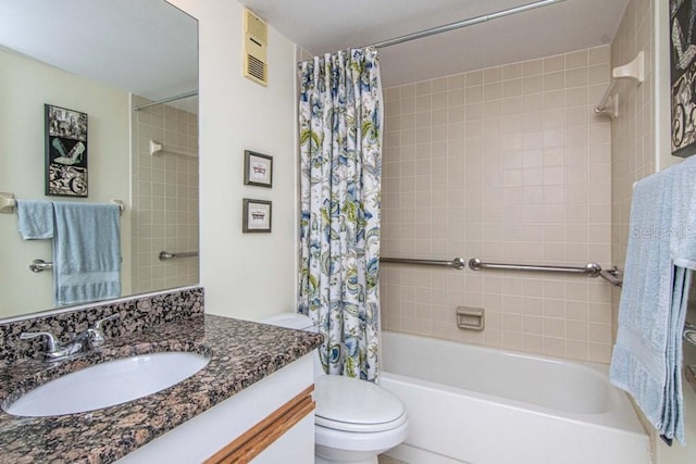 bathroom featuring visible vents, shower / tub combo with curtain, vanity, and toilet