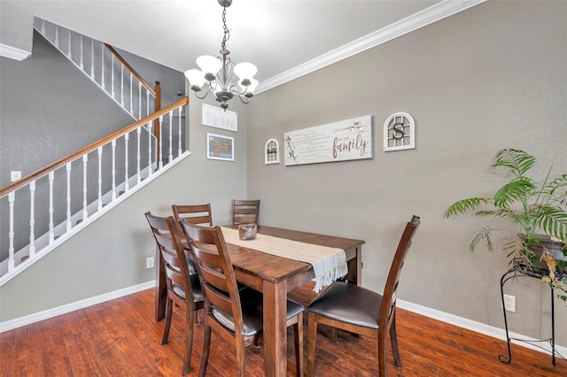 dining area featuring a notable chandelier, ornamental molding, wood finished floors, baseboards, and stairs