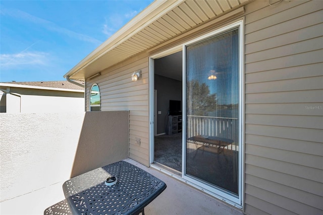 entrance to property featuring a balcony