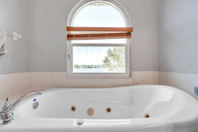 full bath with a jetted tub