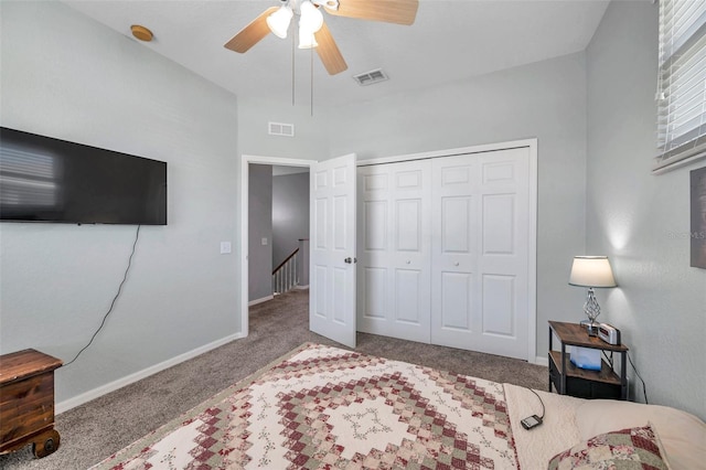 bedroom featuring carpet, a closet, visible vents, and baseboards