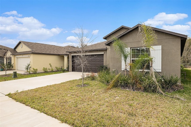 view of front of property featuring stucco siding, a shingled roof, concrete driveway, an attached garage, and a front lawn