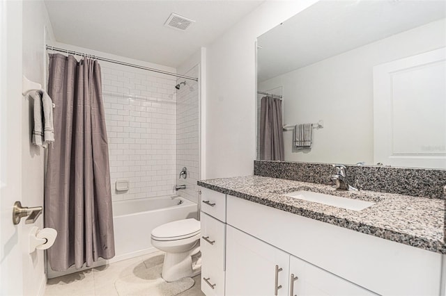 full bath with visible vents, toilet, shower / bath combo, vanity, and tile patterned flooring