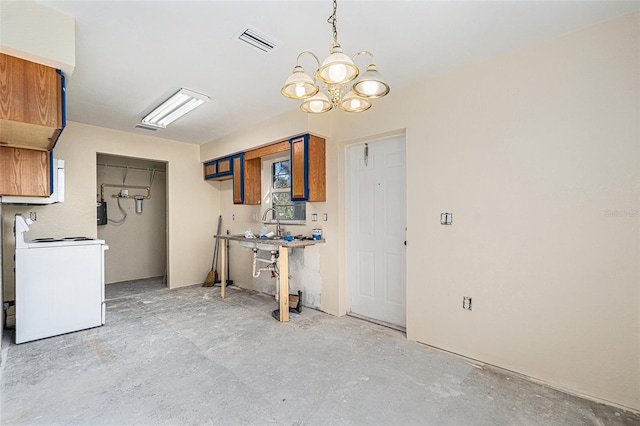 kitchen with electric range, visible vents, washer / clothes dryer, concrete flooring, and a chandelier