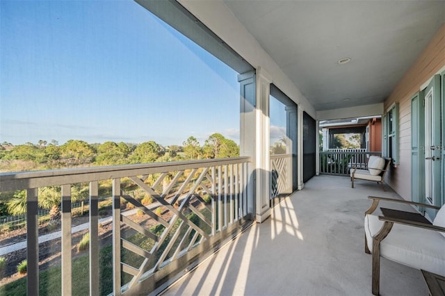 balcony featuring a sunroom