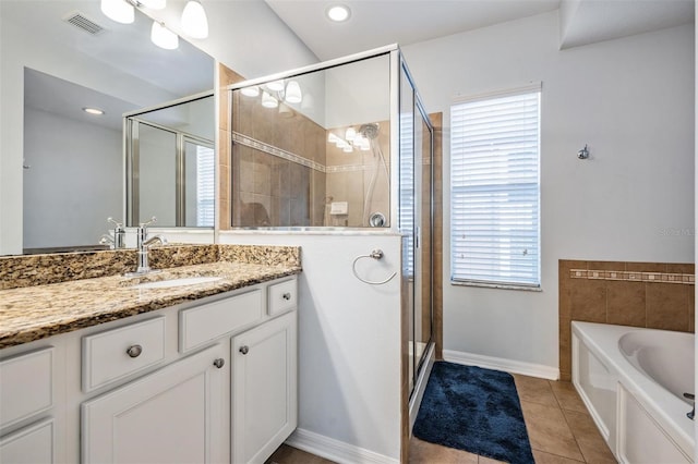 bathroom featuring visible vents, a stall shower, vanity, tile patterned flooring, and a bath