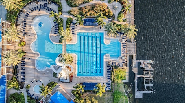 birds eye view of property featuring a water view