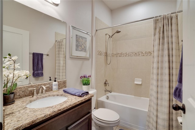 full bathroom featuring toilet, shower / bath combination with curtain, and vanity