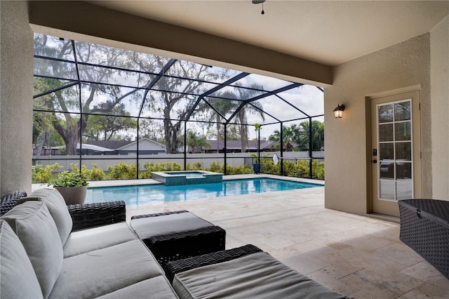 view of pool featuring a patio area, a pool with connected hot tub, and glass enclosure