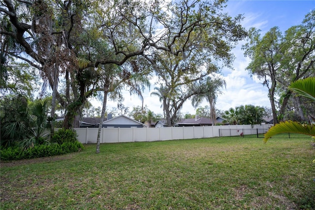 view of yard with fence