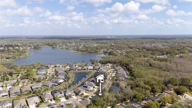 aerial view with a residential view and a water view