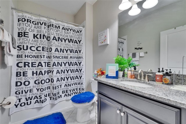 full bath with tile patterned floors, toilet, vanity, and shower / bath combo with shower curtain