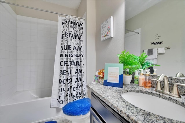 bathroom with vanity, toilet, and shower / tub combo