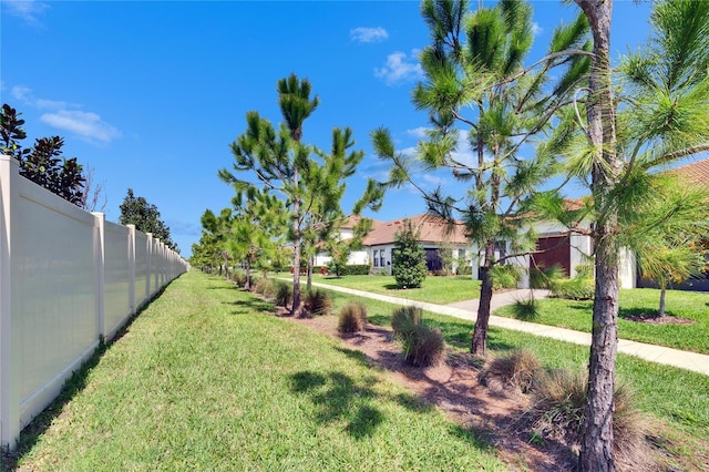 view of yard with fence
