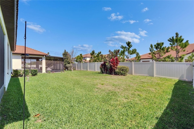 view of yard featuring a fenced backyard