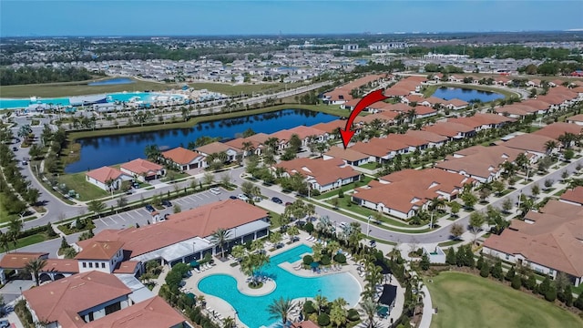 aerial view with a residential view and a water view