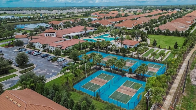 birds eye view of property with a residential view
