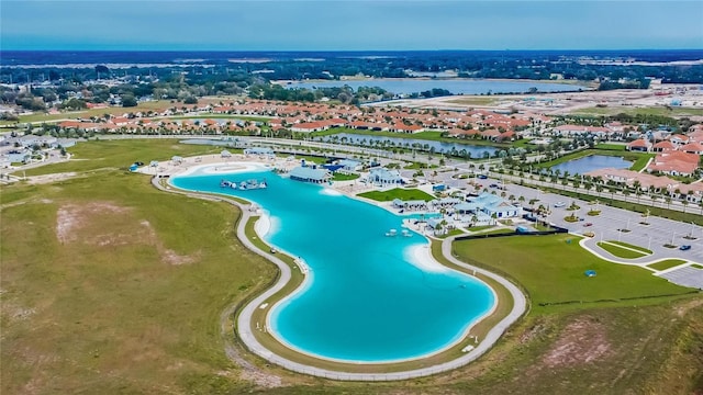 drone / aerial view with a water view