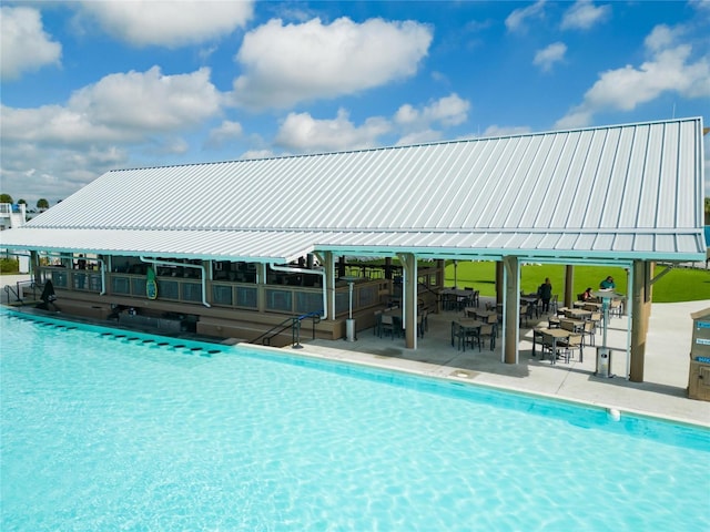 community pool with a patio
