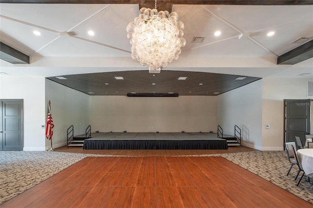 interior space with visible vents and an inviting chandelier