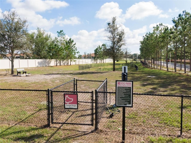 exterior space with fence and a gate