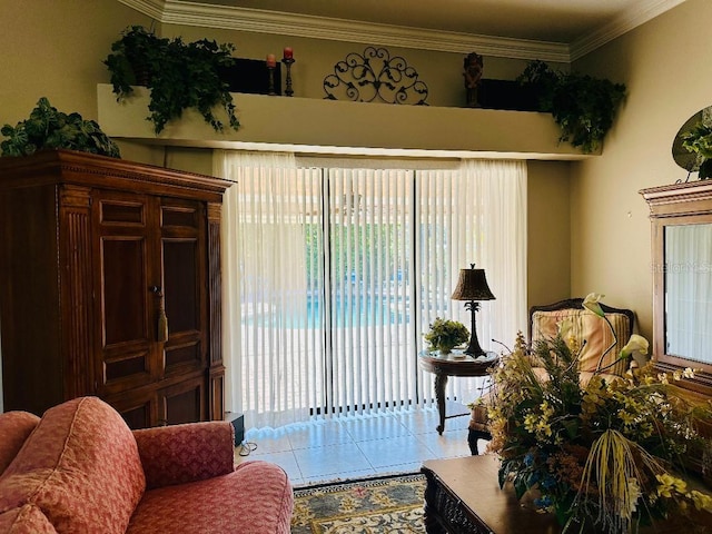 living area with tile patterned flooring and crown molding