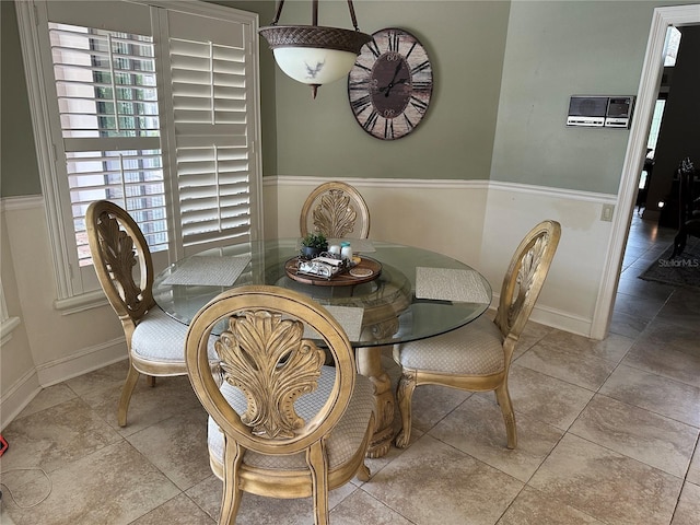 dining area with tile patterned floors