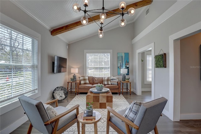 living room with a chandelier, vaulted ceiling with beams, wood finished floors, visible vents, and baseboards