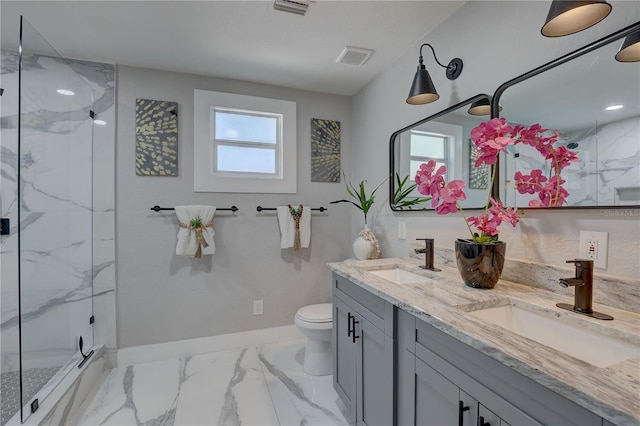 315 40th St S, Saint Petersburg, FL 33711 - bathroom with toilet, a sink, and a marble finish shower