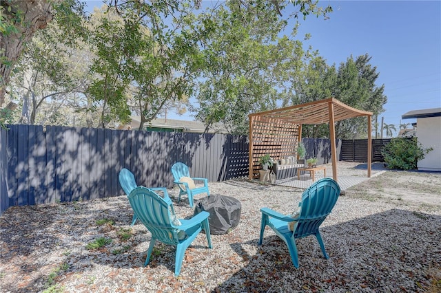 315 40th St S, Saint Petersburg, FL 33711 - view of yard featuring a patio area, a fenced backyard, and a pergola