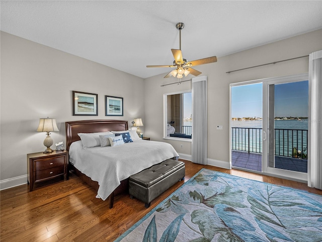 bedroom with access to outside, baseboards, ceiling fan, and wood finished floors