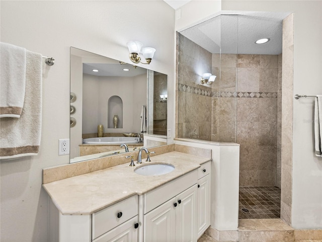 full bath featuring walk in shower and vanity